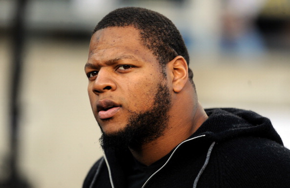 Ndamukong Suh of the Detroit Lions looks on from the sidelines before the Pac-12 Championship game between the UCLA Bruins and the Oregon Ducks at Autzen Stadium on December 2, 2011 in Eugene, Oregon. (Credit: Steve Dykes/Getty Images)