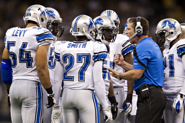NEW ORLEANS, LA - DECEMBER 4: Head Coach Jim Schwartz of the Detroit Lions talks with his team during a game against the New Orleans Saints to score a touchdown at Mercedes-Benz Superdome on December 4, 2011 in New Orleans, Louisiana. The Saints defeated the Lions 31-17. (Photo by Wesley Hitt/Getty Images)