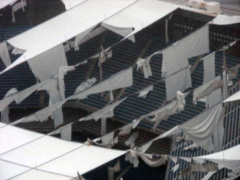 The roof of the Pontiac Silverdome has been visibly damaged by strong winds. (WWJ Photo/Bill Szumanski)