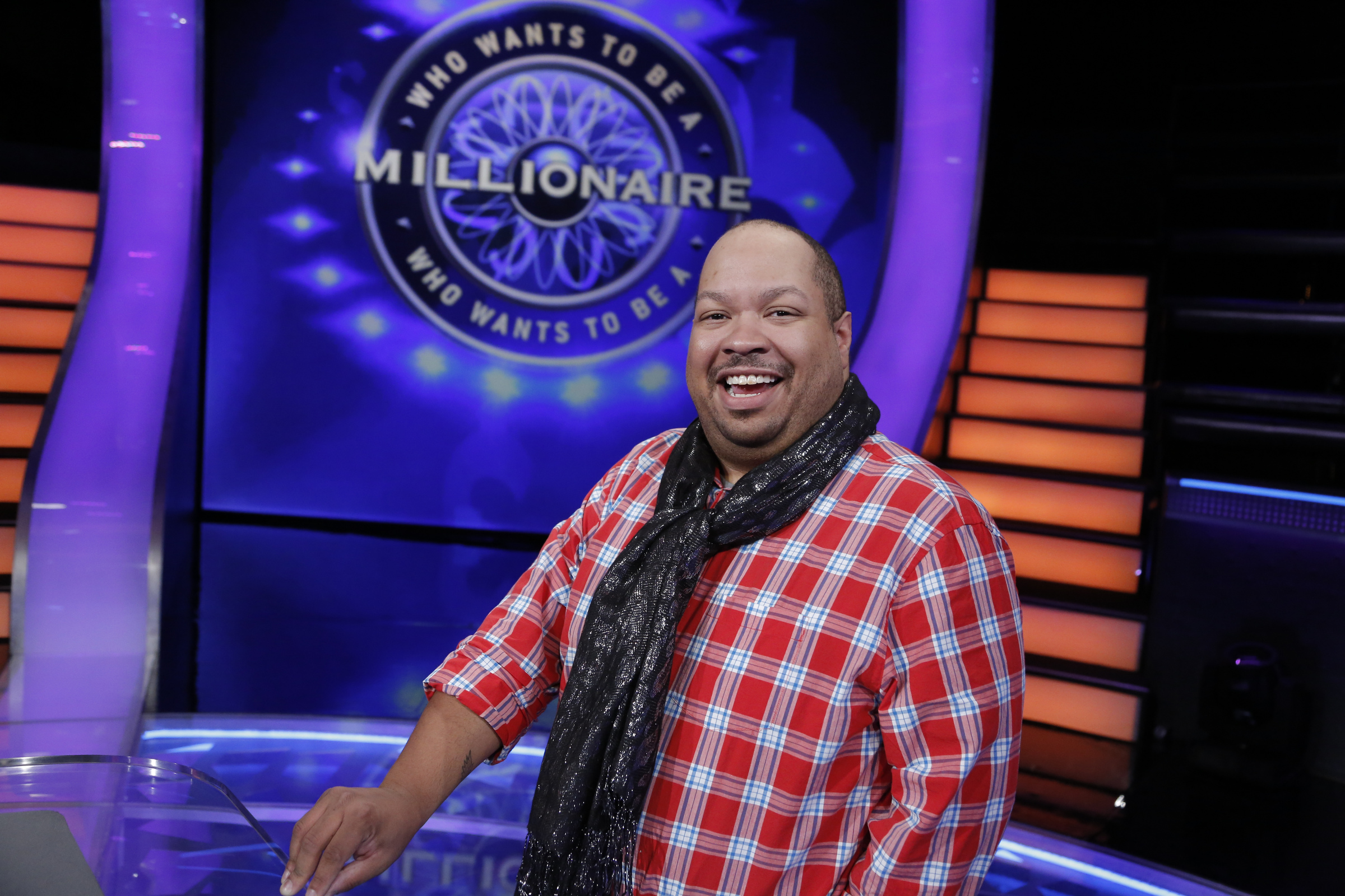 Terrill Sanford from Southfield, Mich. is the first contestant on WHO WANTS TO BE A MILLIONAIRE with Cedric The Entertainer. (Disney-ABC/Heidi Gutman)