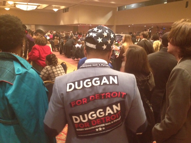 A Duggan supporter in the crowd gathered viewing results in Detroit's mayoral election. (WWJ/Vickie Thomas)