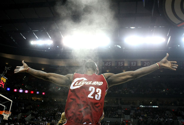 PORTLAND, OR - JANUARY 30:  LeBron James #23 of the Cleveland Cavaliers thorws talcum power in the air before the start of the game against the Portland Trail Blazers at the Rose Garden on January 30, 2008 in Portland, Oregon.