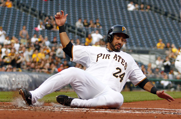 PITTSBURGH, PA - MAY 21:  Pedro Alvarez #24 of the Pittsburgh Pirates scores on a two-RBI triple in the first inning against the Baltimore Orioles during interleague play at PNC Park May 21, 2014 in Pittsburgh, Pennsylvania.