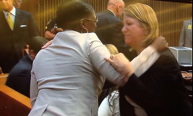 Renisha McBride's mother hugs prosecutor Athena Siringas after the verdict is read. (credit: Marie Osborne/WWJ)