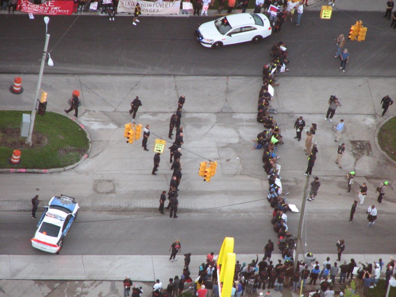 Dozens of people were arrested during a minimum wage protest outside a Detroit McDonald's. (Credit: Bill Szumanski/WWJ Newsradio 950)