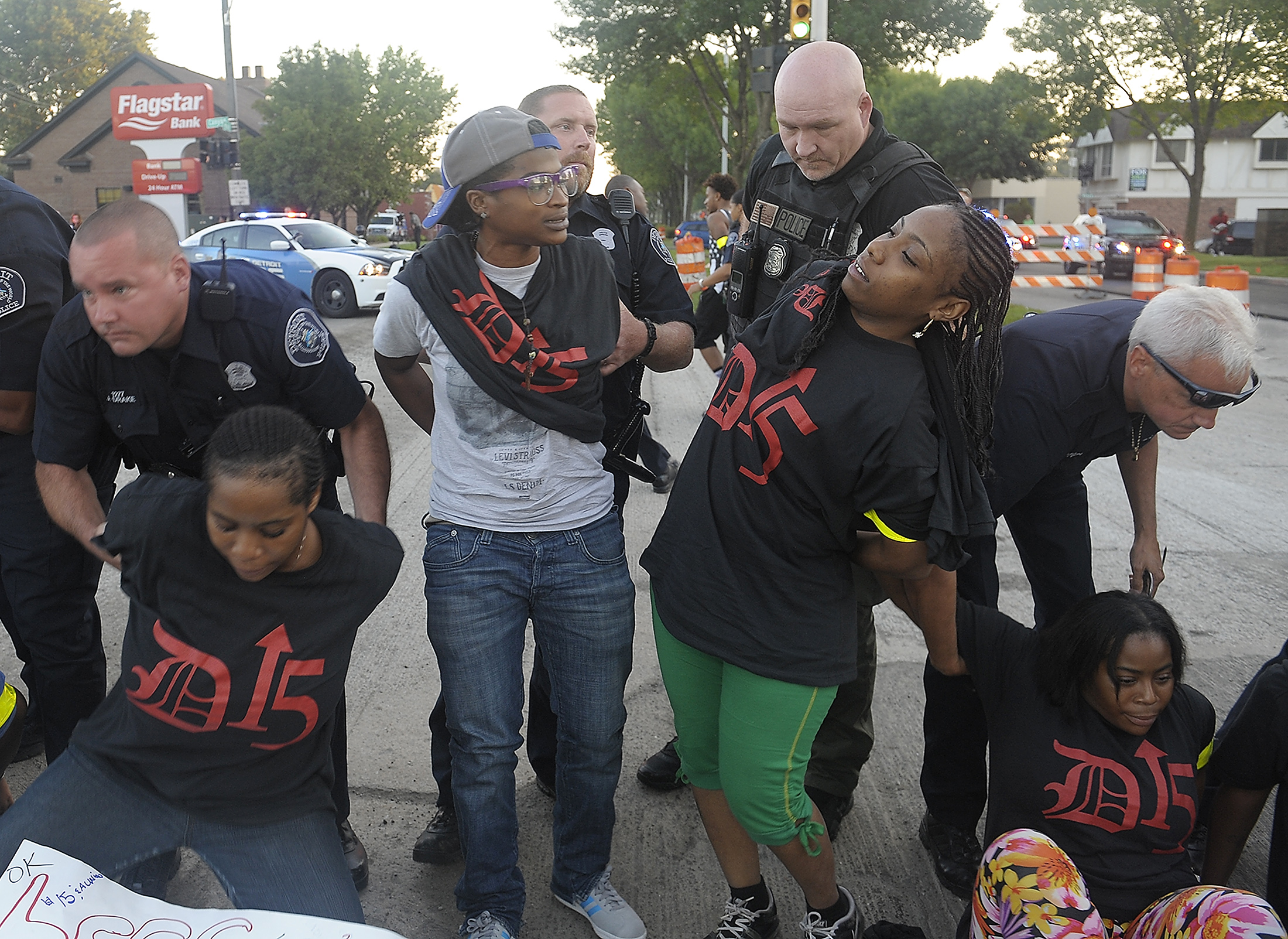 Dozens of people were arrested during a minimum wage protest outside a Detroit McDonald's. (Credit: Darci E. McConnell/D15 campaign)