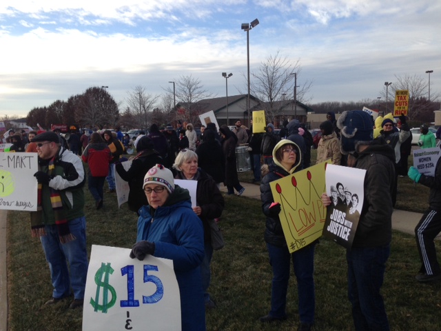 Protesters demonstrate outside of a Walmart in Sterling Heights (Photo: Vickie Thomas/WWJ)