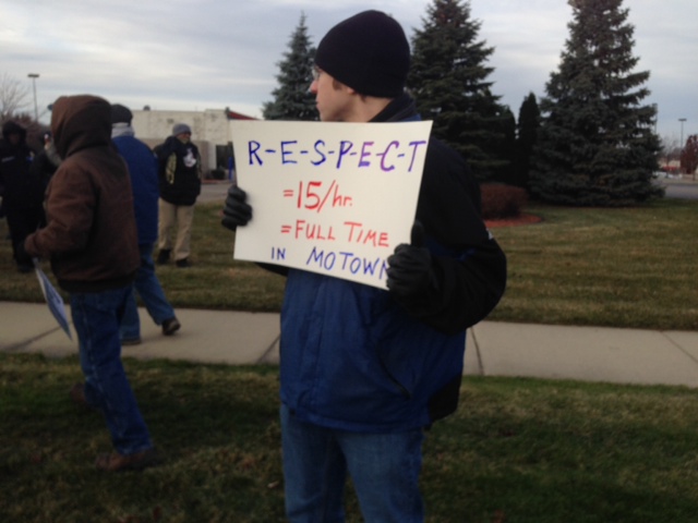 Protesters demonstrate outside of a Walmart in Sterling Heights (Photo: Vickie Thomas/WWJ)