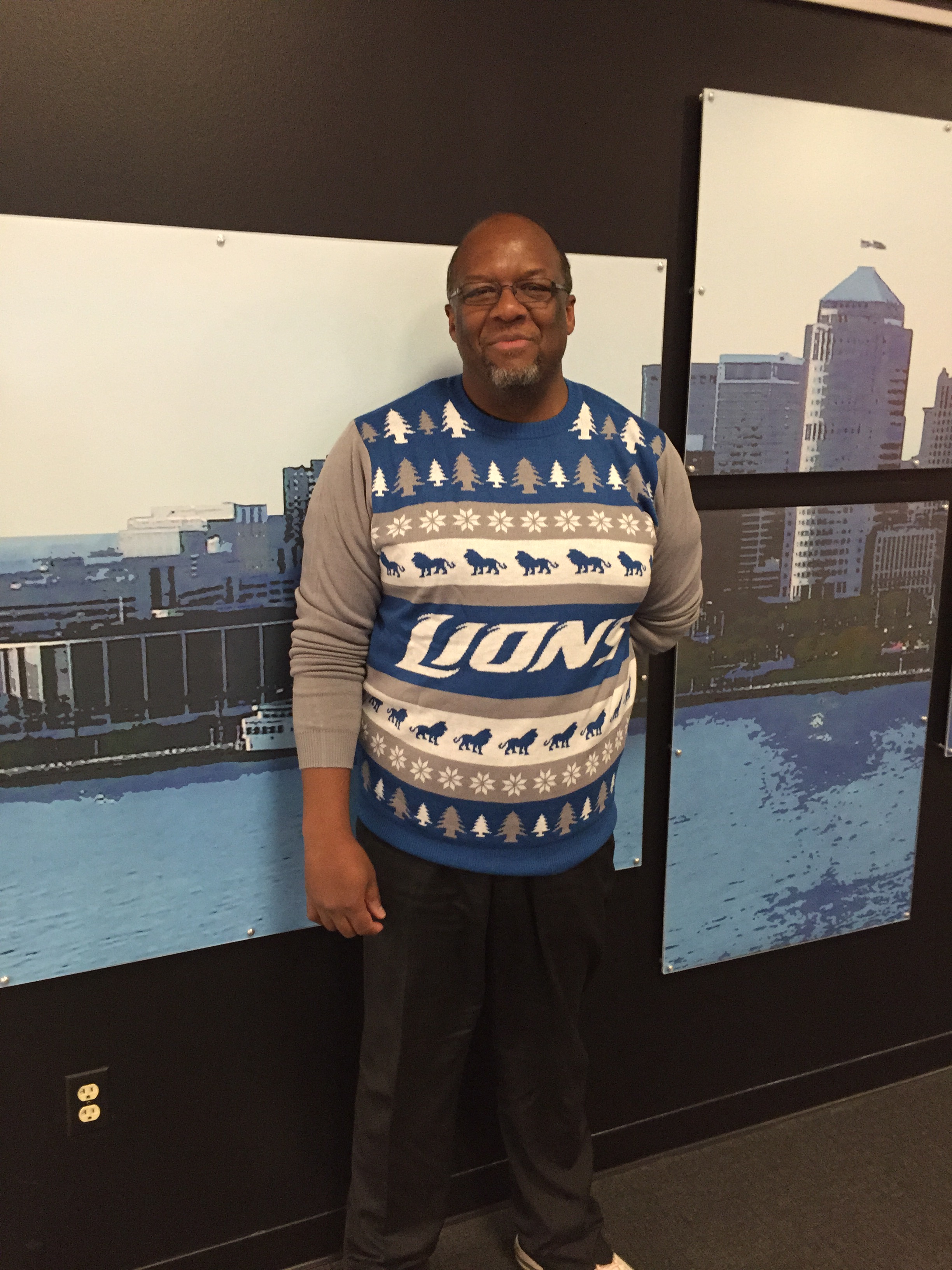 WWJ's Tony Ortiz gave the Lions sweater a go. (credit: Terri Lee/WWJ)