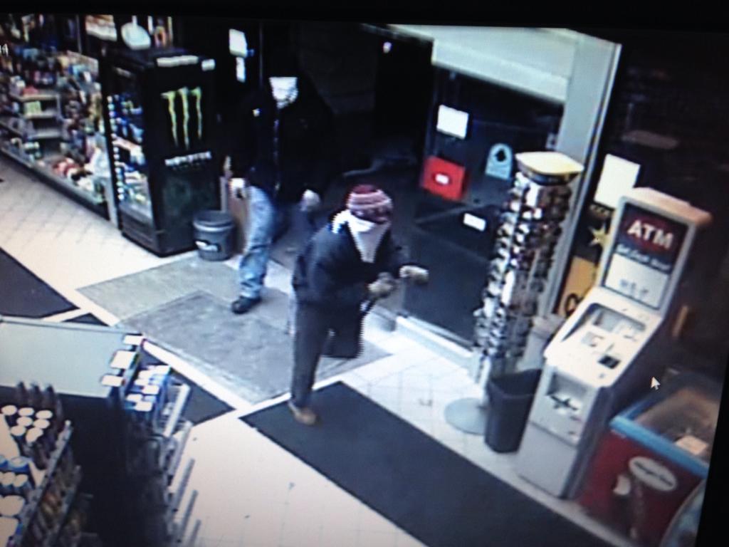 Men suspected of stealing a gas station ATM are seen on security footage. (Credit: Charlie Langton/WWJ Newsradio 950)