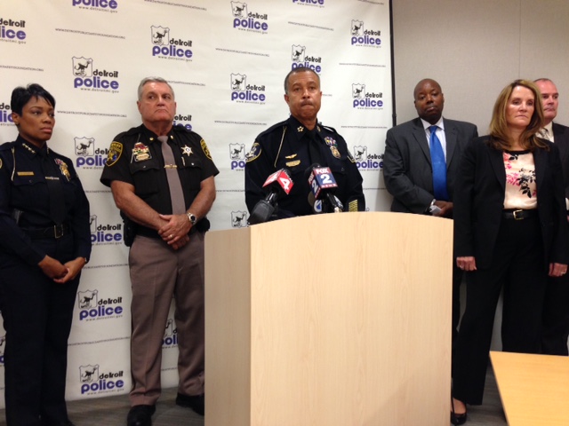 Detroit Police Chief James Craig, at podium, speaks on raids meant to curb heroin sales. (credit: Vickie Thomas/WWJ)