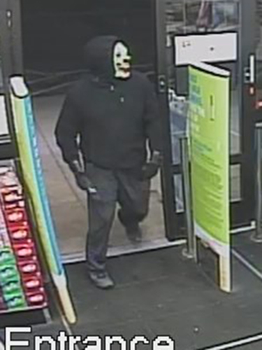 Police are trying to identify this "clown" who robbed a Downriver Walgreens (police handout)