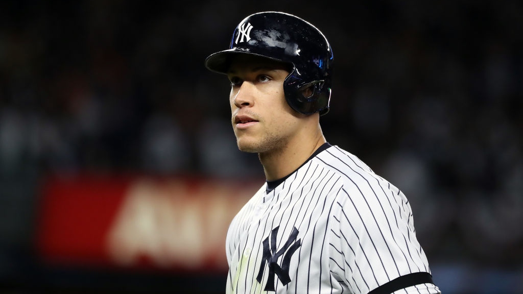 Aaron Judge #99 of the New York Yankees reacts after drawing a walk against the Houston Astros during the fifth inning in game four of the American League Championship Series at Yankee Stadium on October 17, 2019 in New York City.