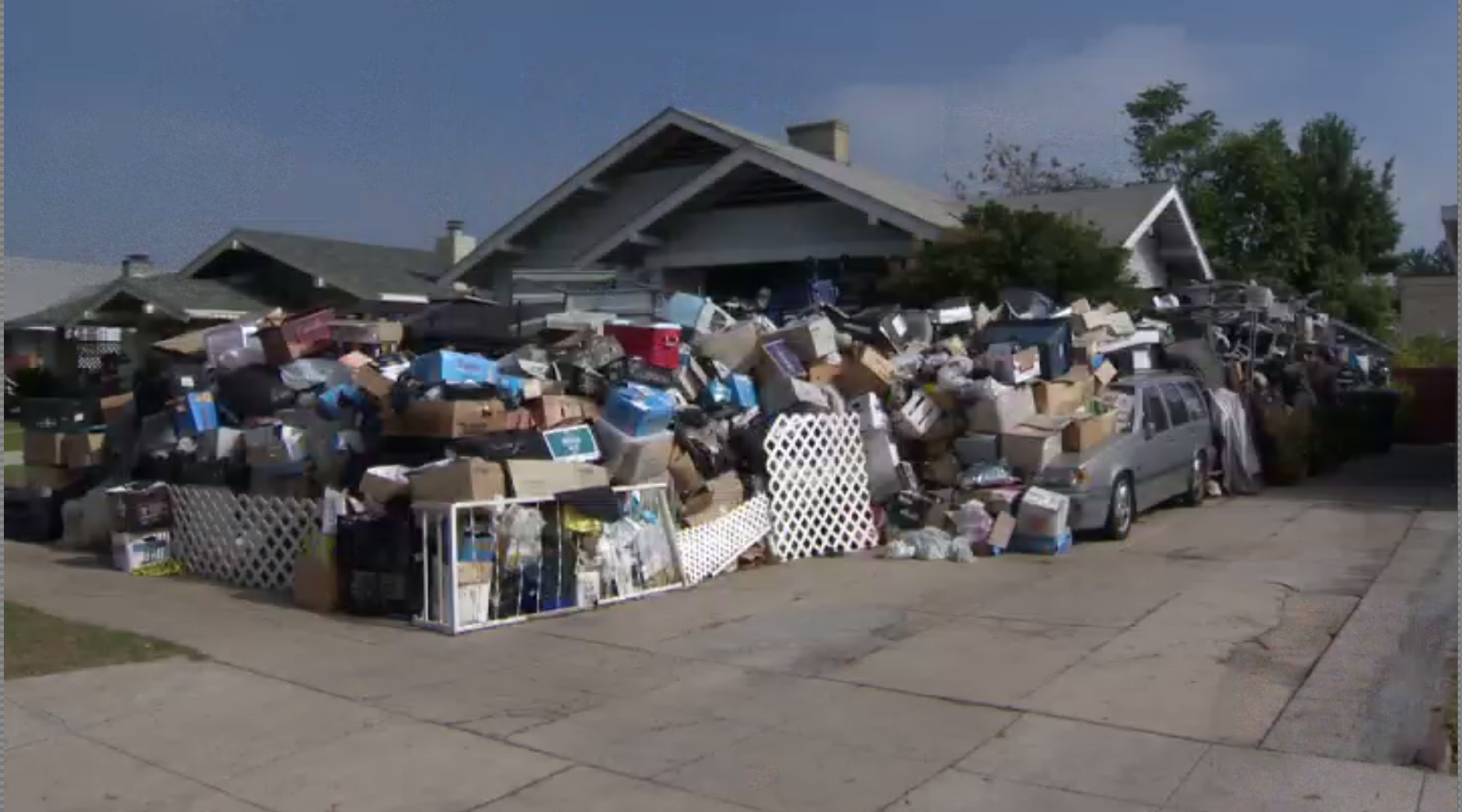 Eight-Foot Wall Of Junk At Hoarder’s House To Be Cleaned Up By City Of Los Angeles